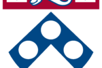 L_wharton_shield Coat of arms featuring an open book on a red background, a stylized animal, and three circles within a blue chevron on a white shield.